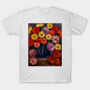 A  lovely boutique of abstract mixed flowers  in a blue vase . T-Shirt